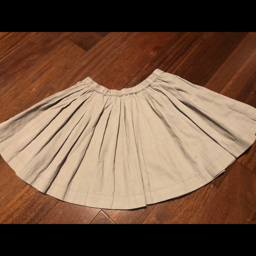 Girl’s light corduroy mini skirt by Peek
